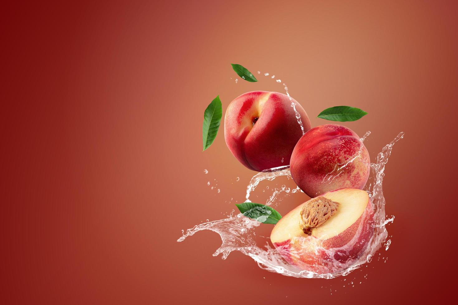 Water splashing on fresh nectarines photo