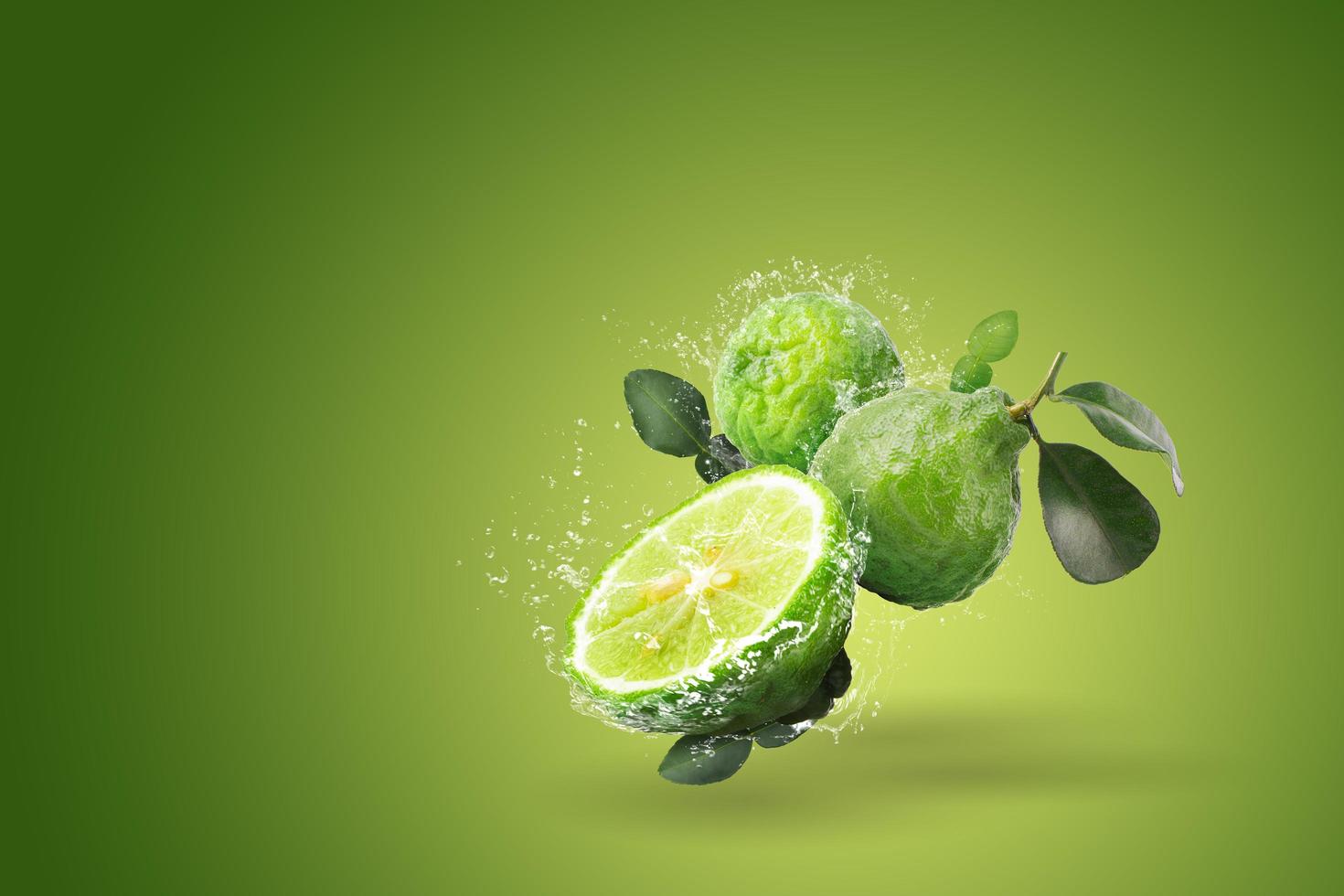 Water splash on bergamot fruit  photo