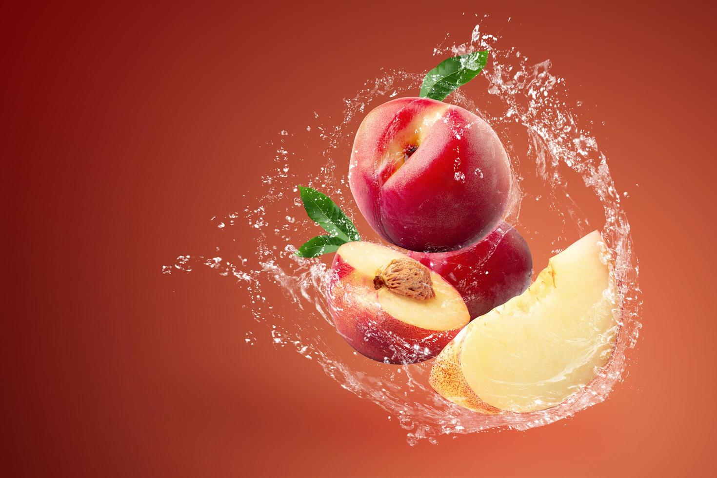 Water splashing and fresh nectarine fruit  photo