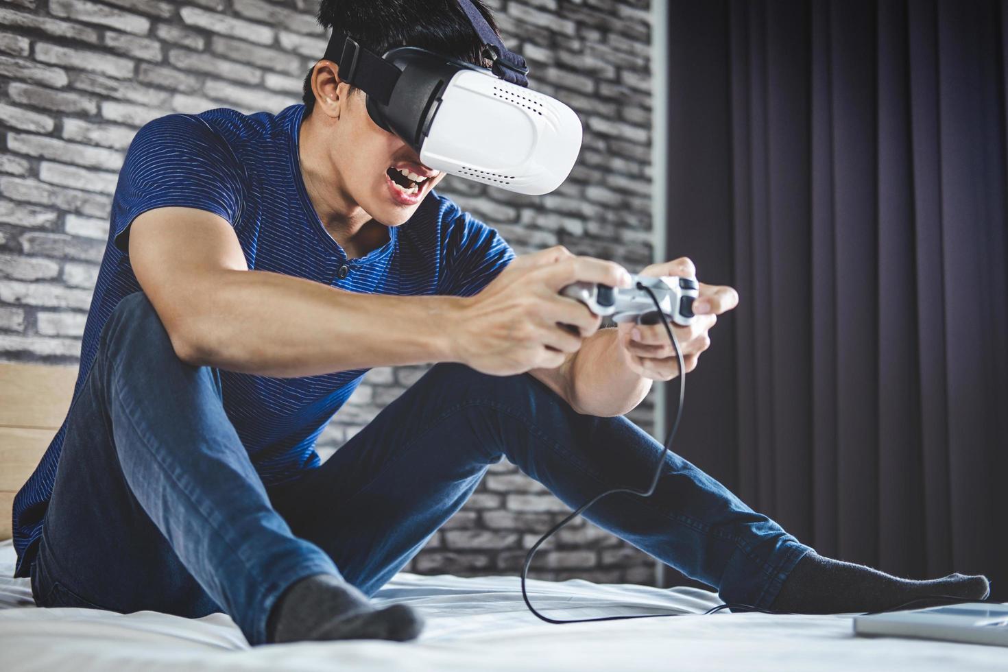 Young man in virtual reality headset  photo