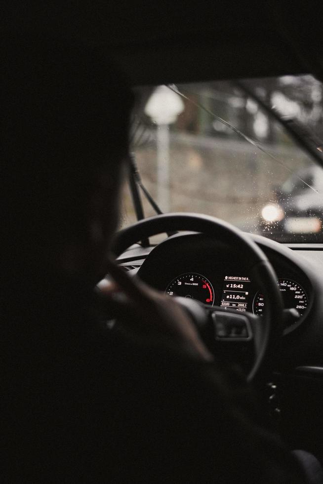 Person driving a car photo