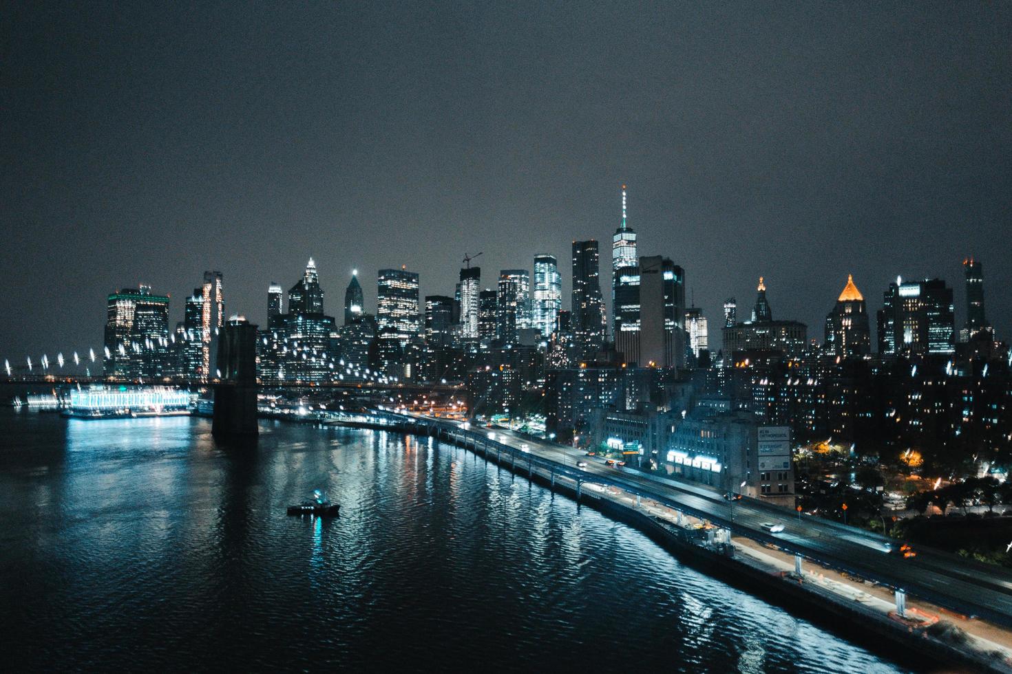 Cityscape near bridge and beach photo