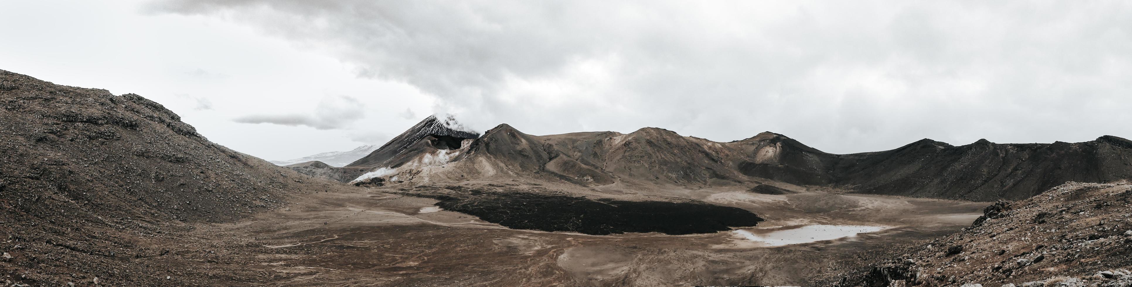 Brown Mountain Under Cloudy Sky photo