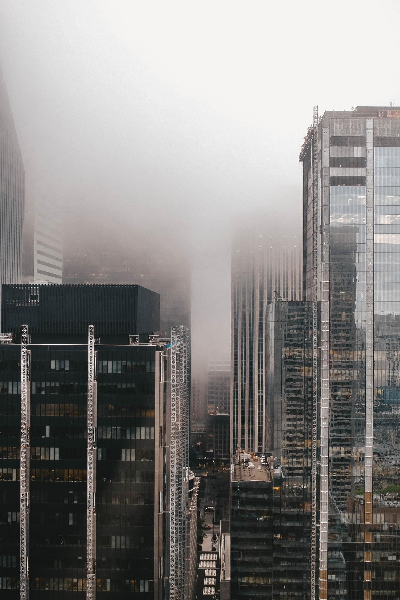Buildings covered in fog 1248129 Stock Photo at Vecteezy