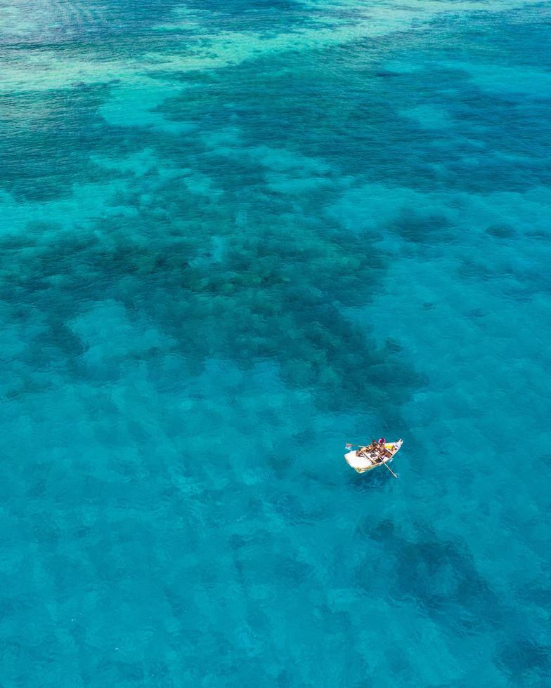 Boat sailing on water photo