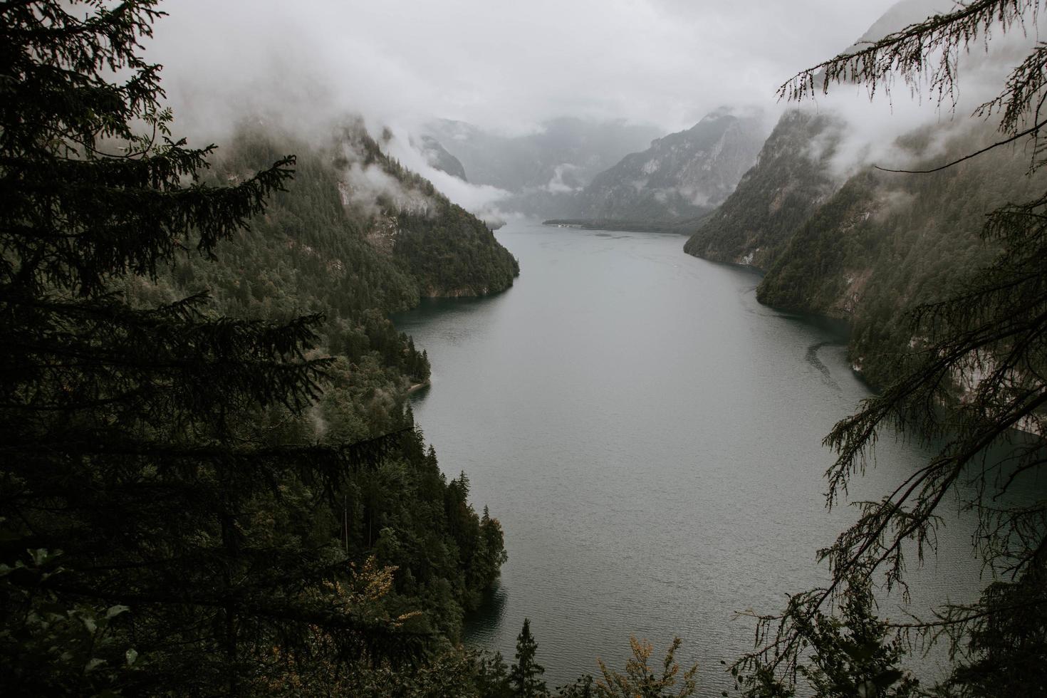 River through foggy mountains photo