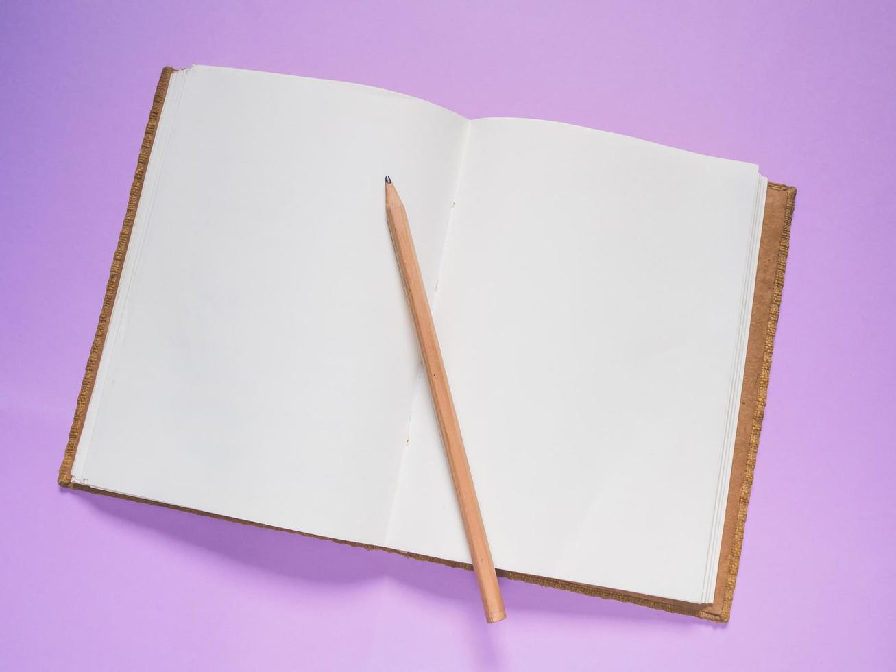 School notebook on a purple background photo