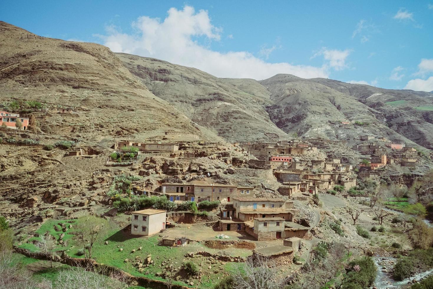 A small village with old flat mud terrace buildings photo