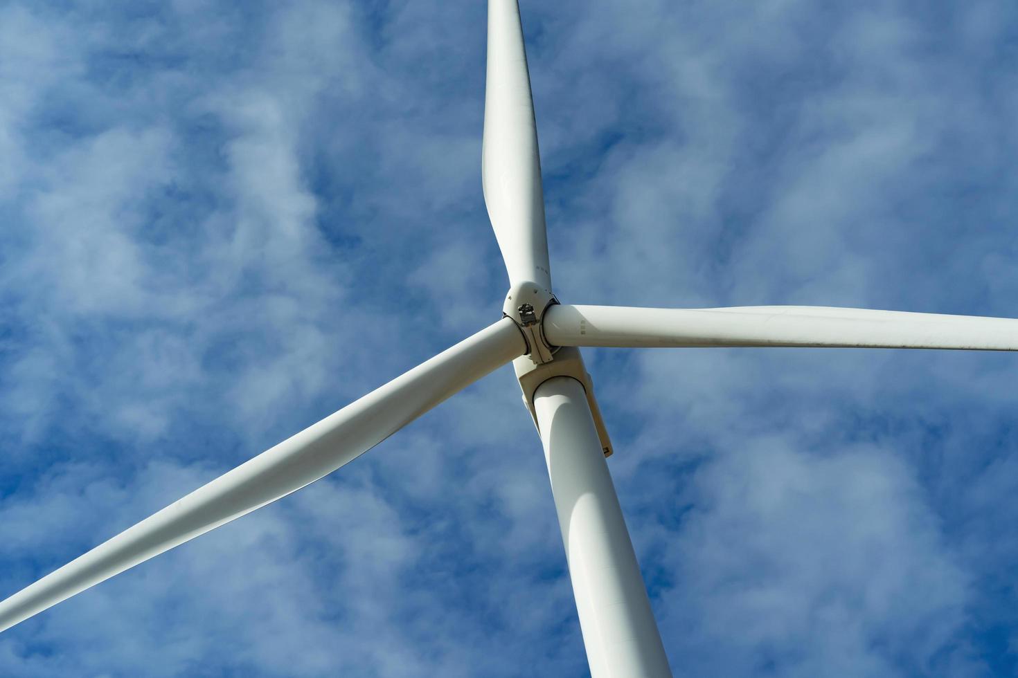 Wind turbine and blue sky photo