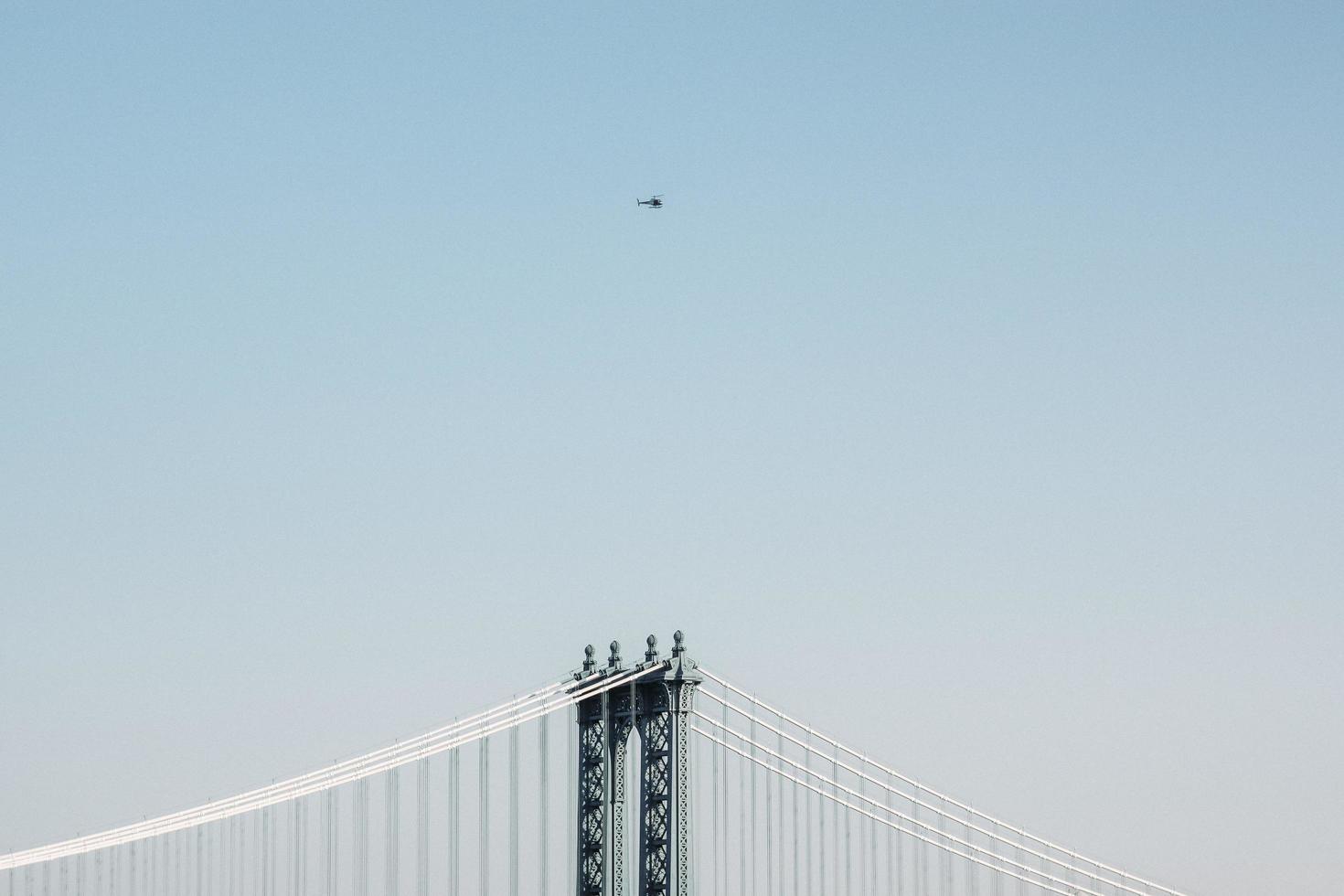 Minimal perspective of bridge at daytime photo