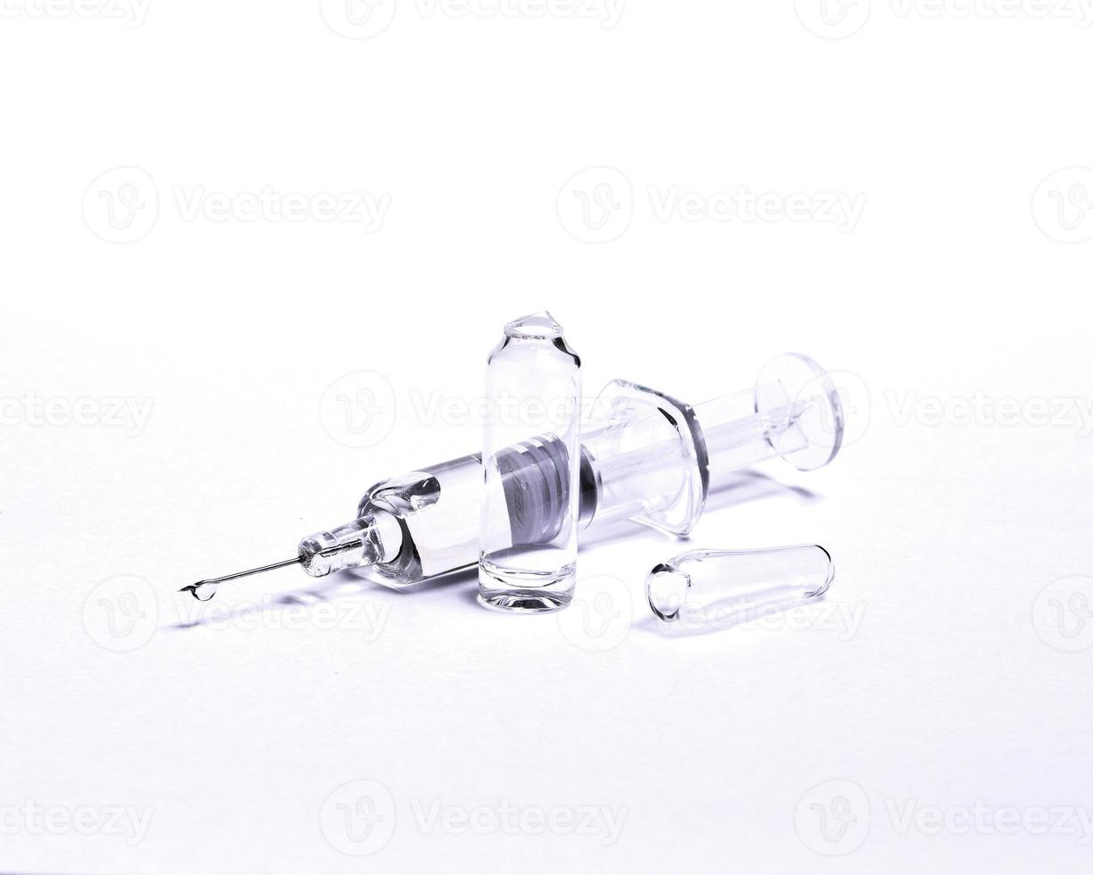 Medical ampule.  on white background photo