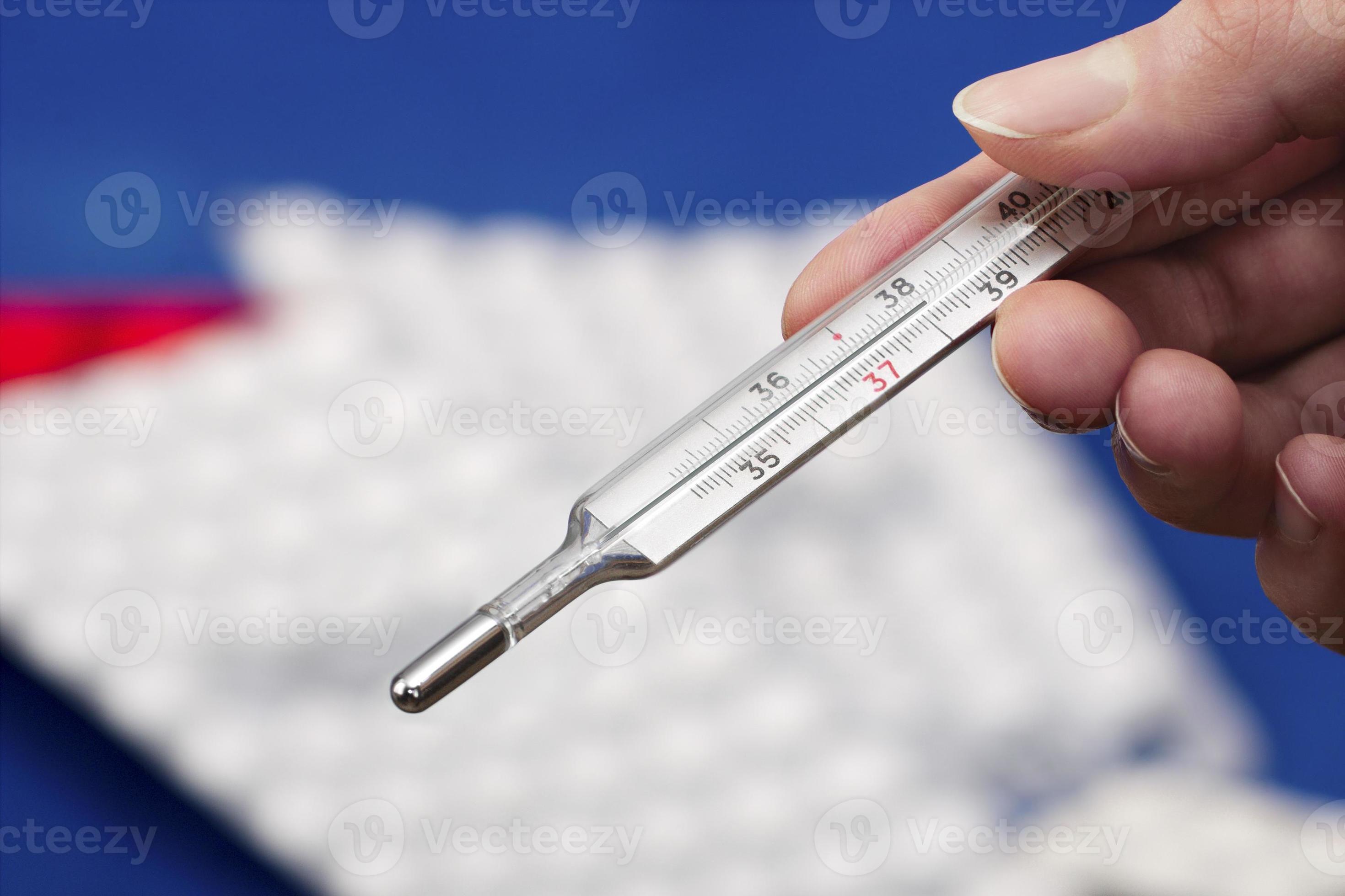 medical-mercury-thermometer-showing-elevated-body-temperature-1261110