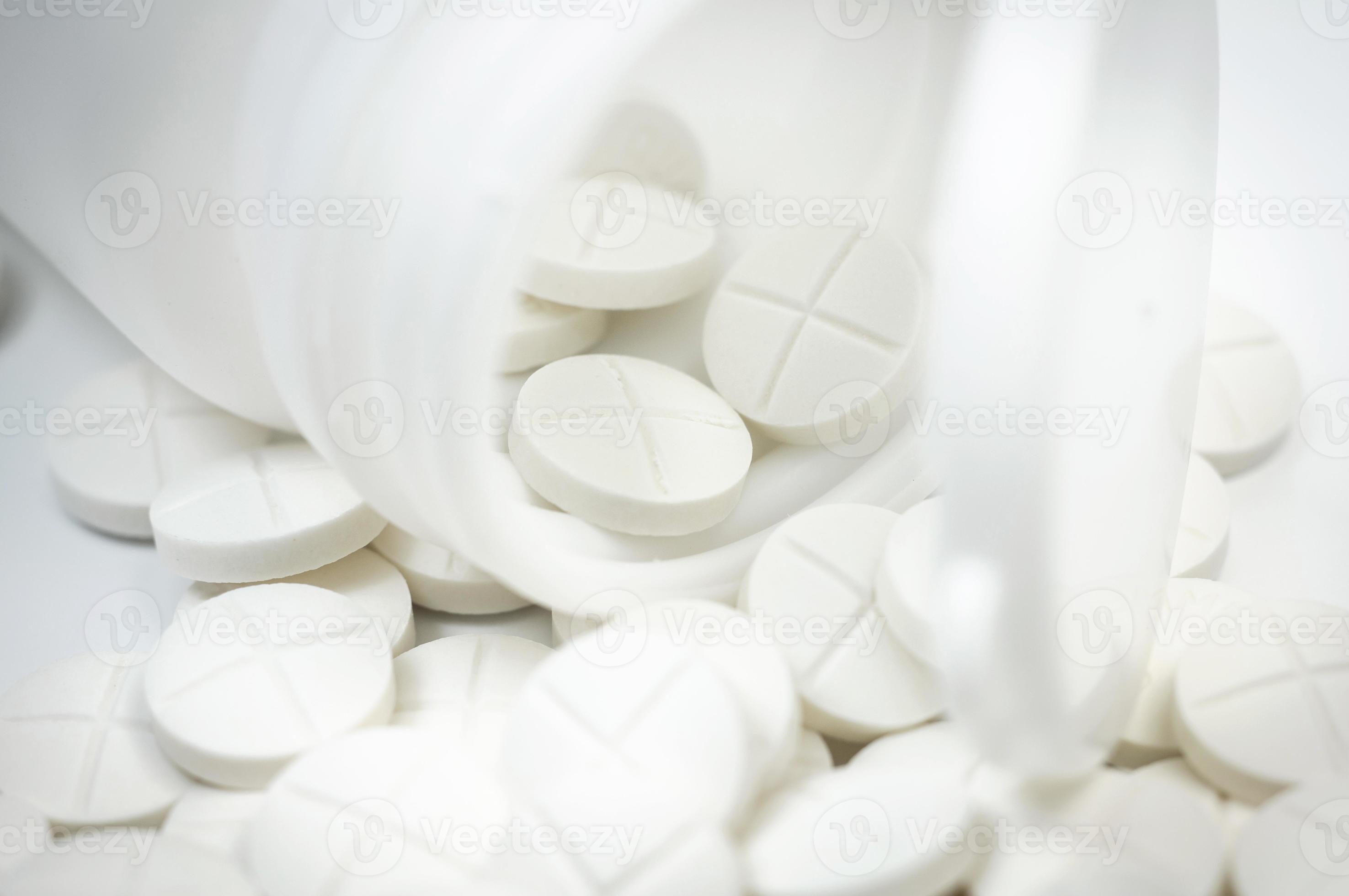 white pills out of pill bottle 1261804 Stock Photo at Vecteezy