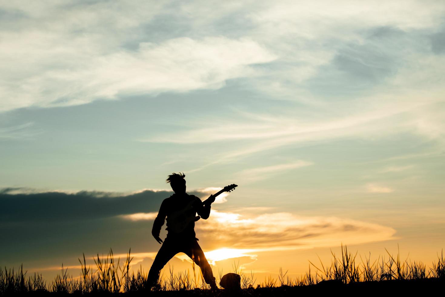 Musician holding guitar  photo