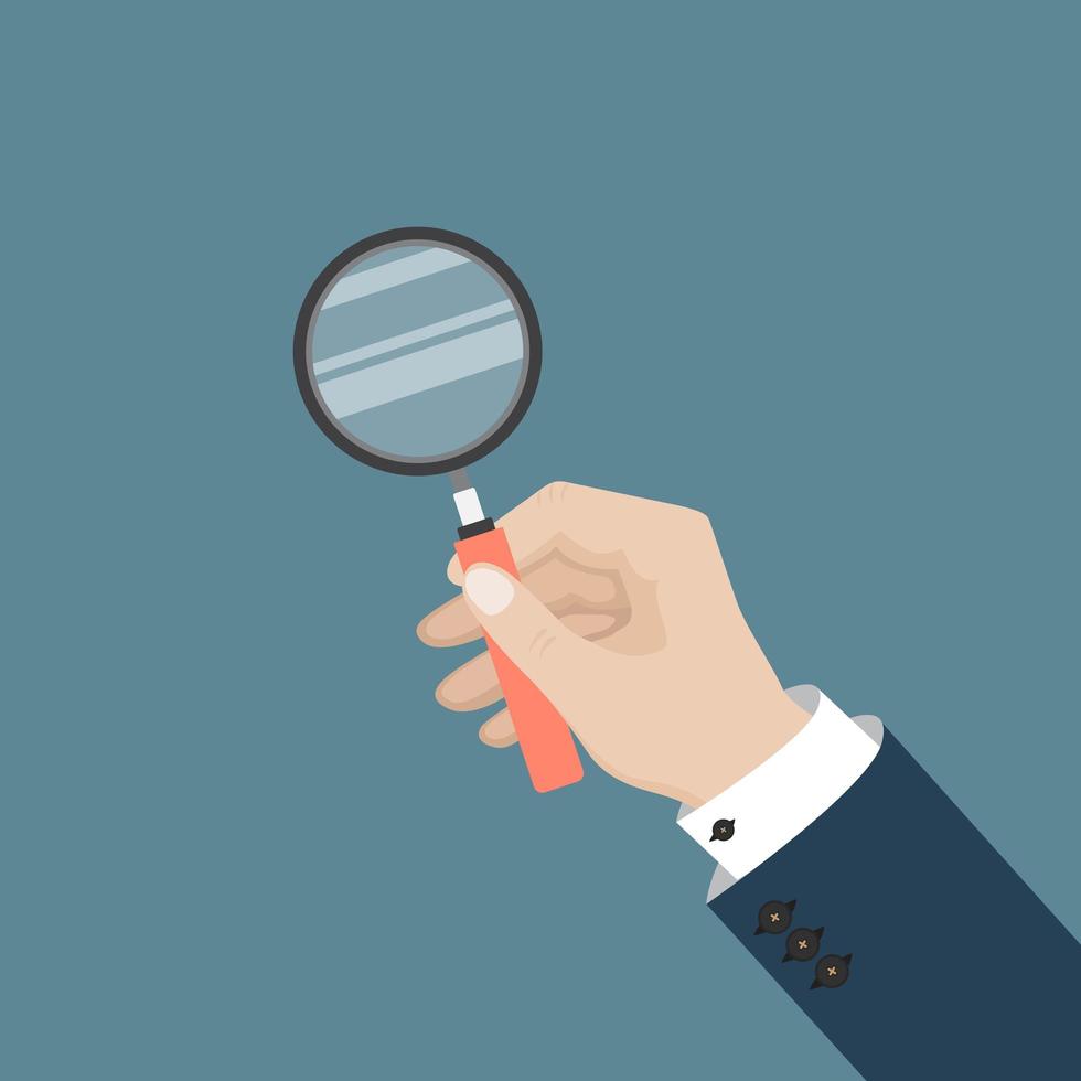 Man hand holds magnifying glass vector