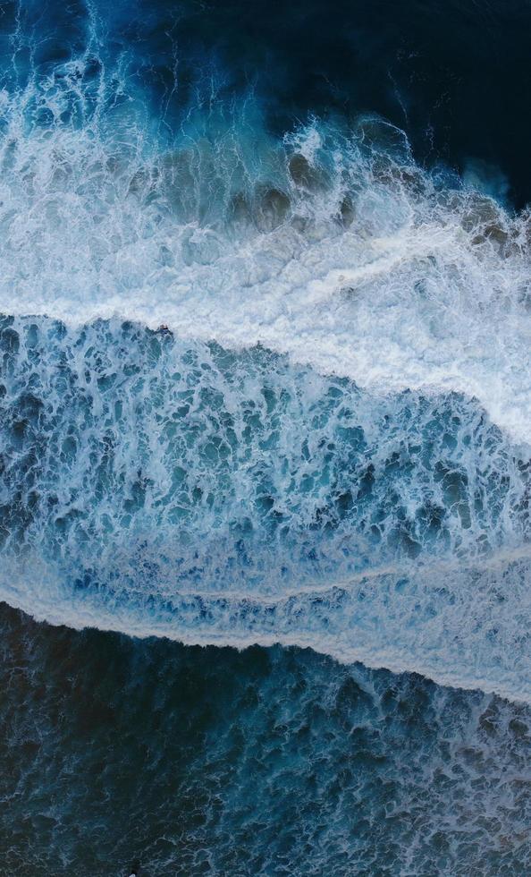 Aerial view of sea waves photo