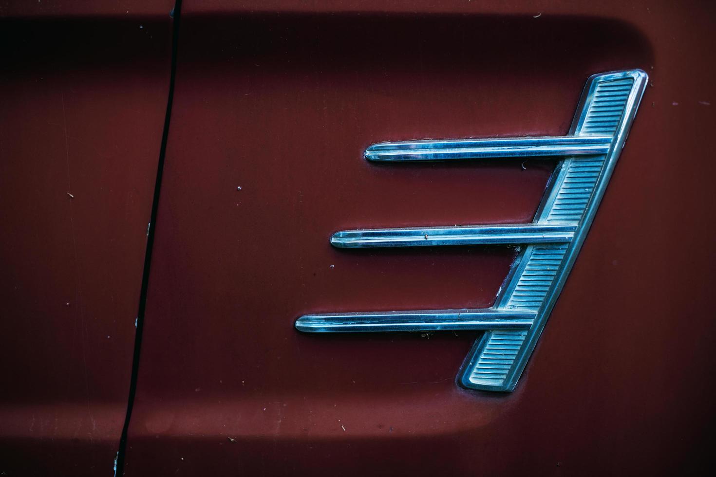 Red car with silver grille photo