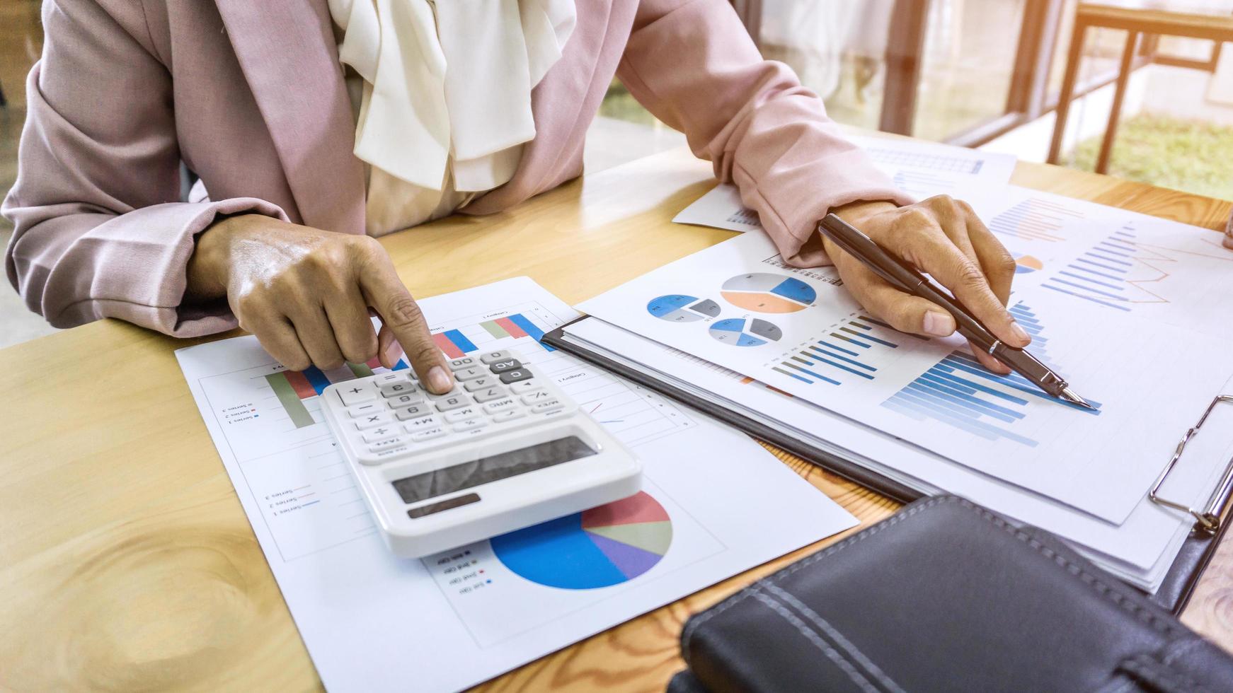 Businesswoman working on financial data photo