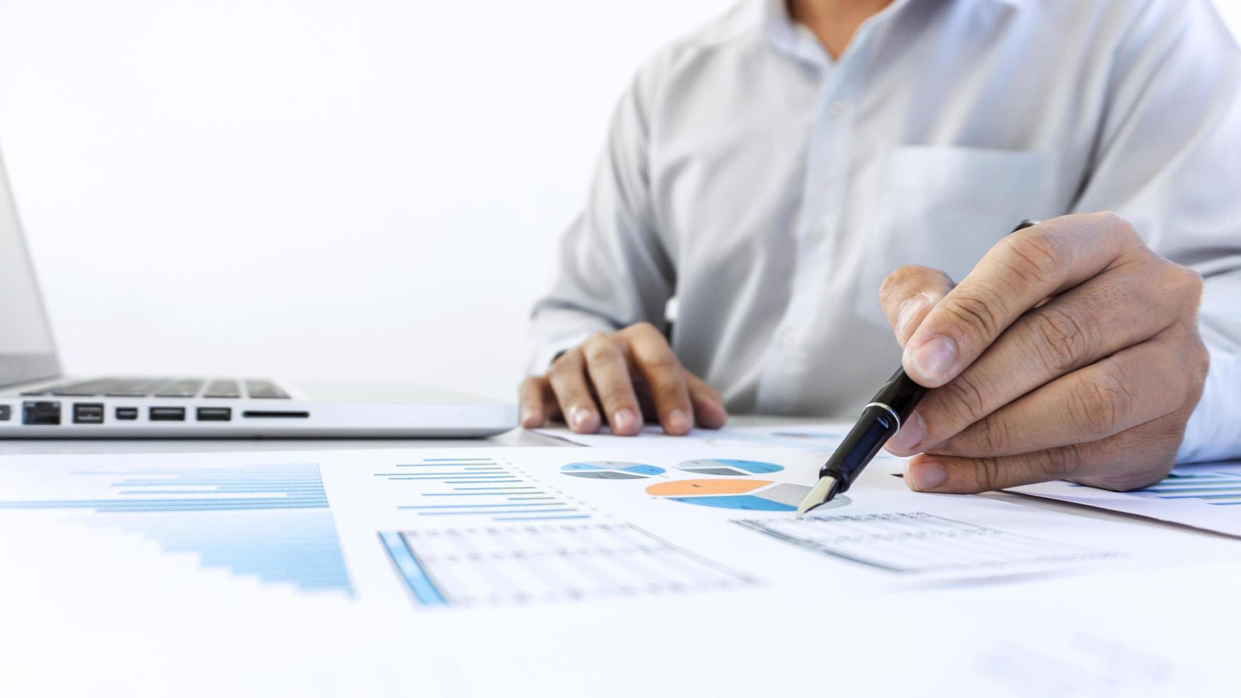 Businessman working on an audit  photo