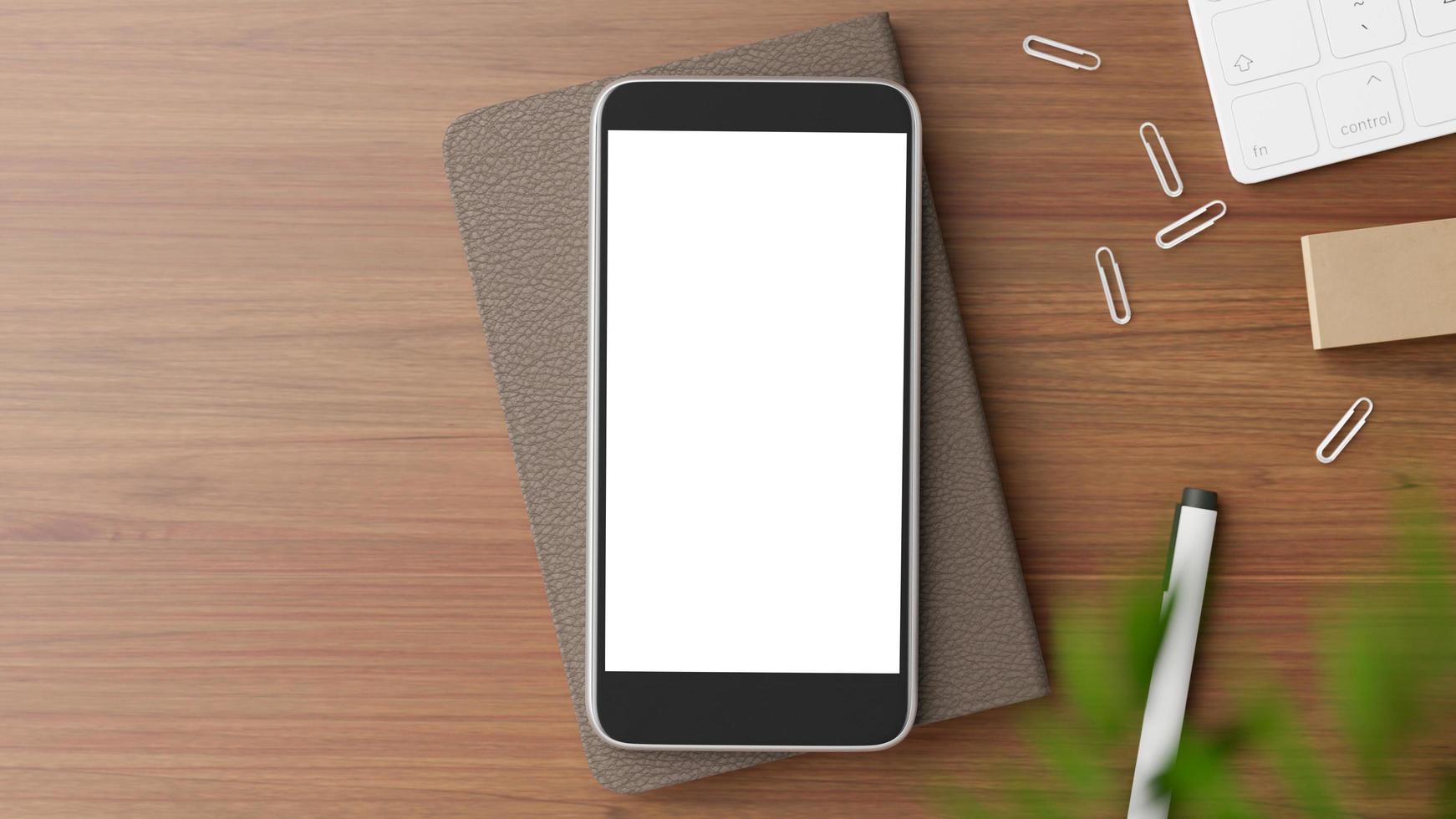 Flat lay of a smartphone mockup on a desk photo