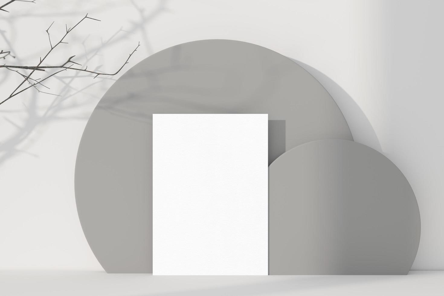 Greeting card mockup with tree branches and grey circles photo