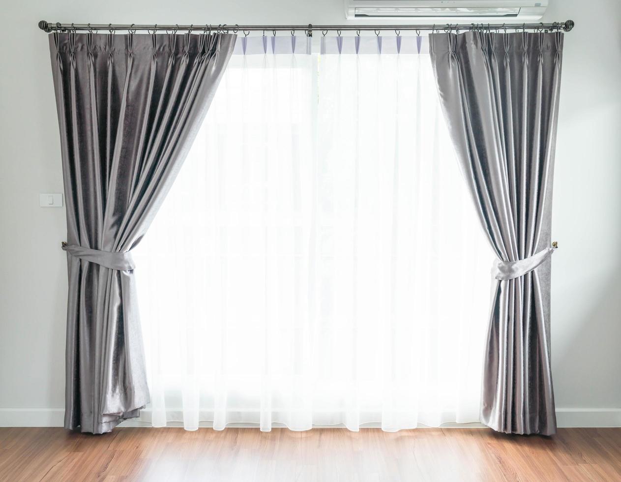Window with gray curtains photo
