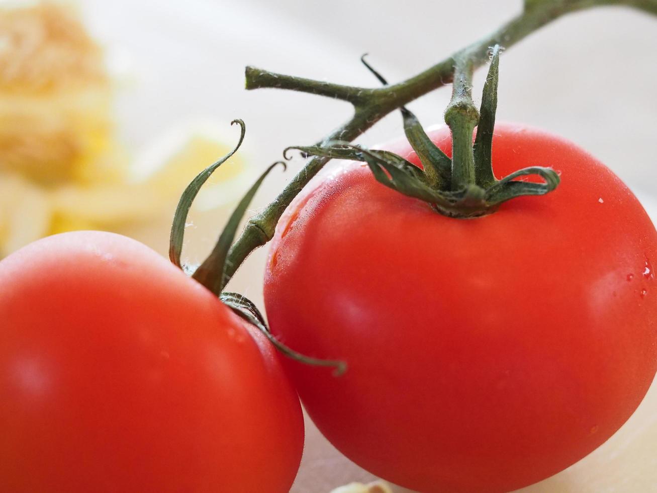 Tomatoes on vine photo