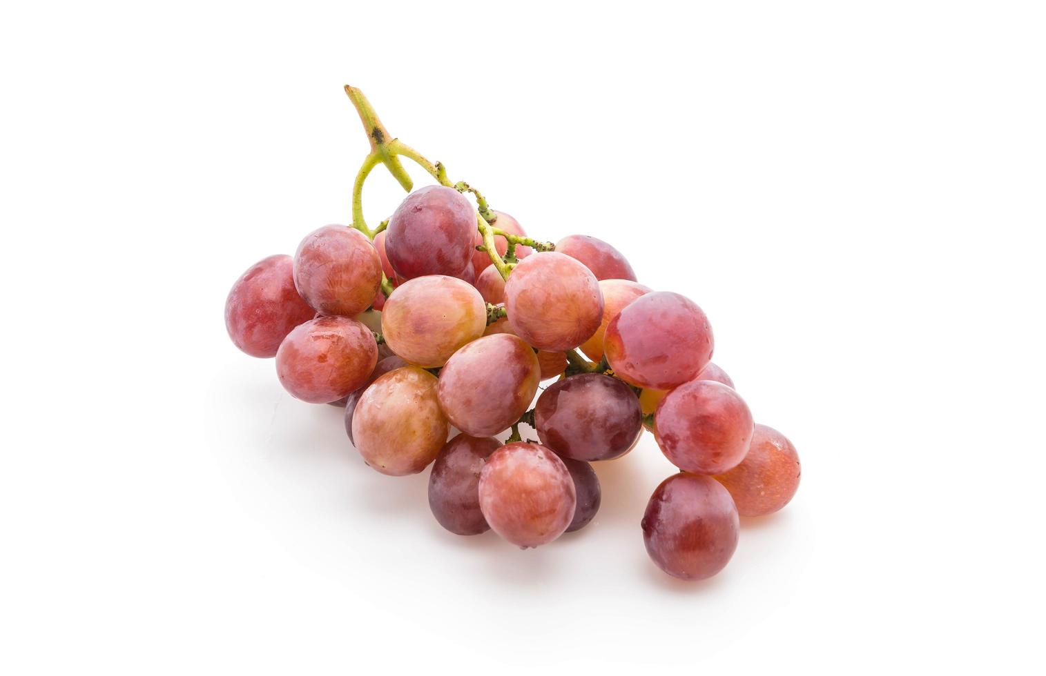 Red grapes on white background photo