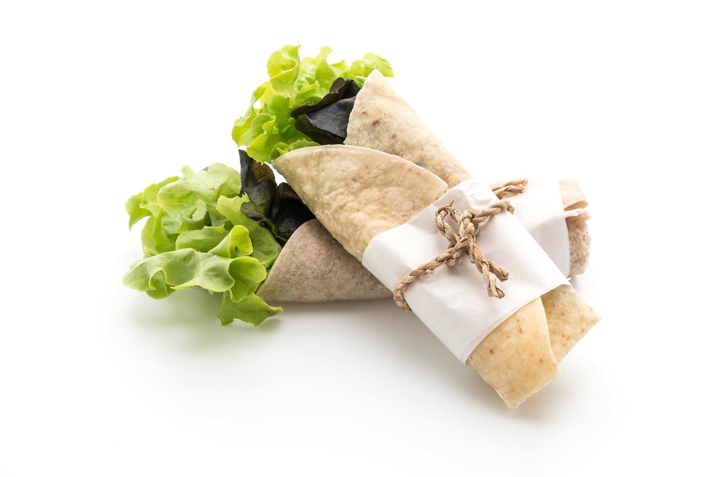 Salad wraps on white background photo