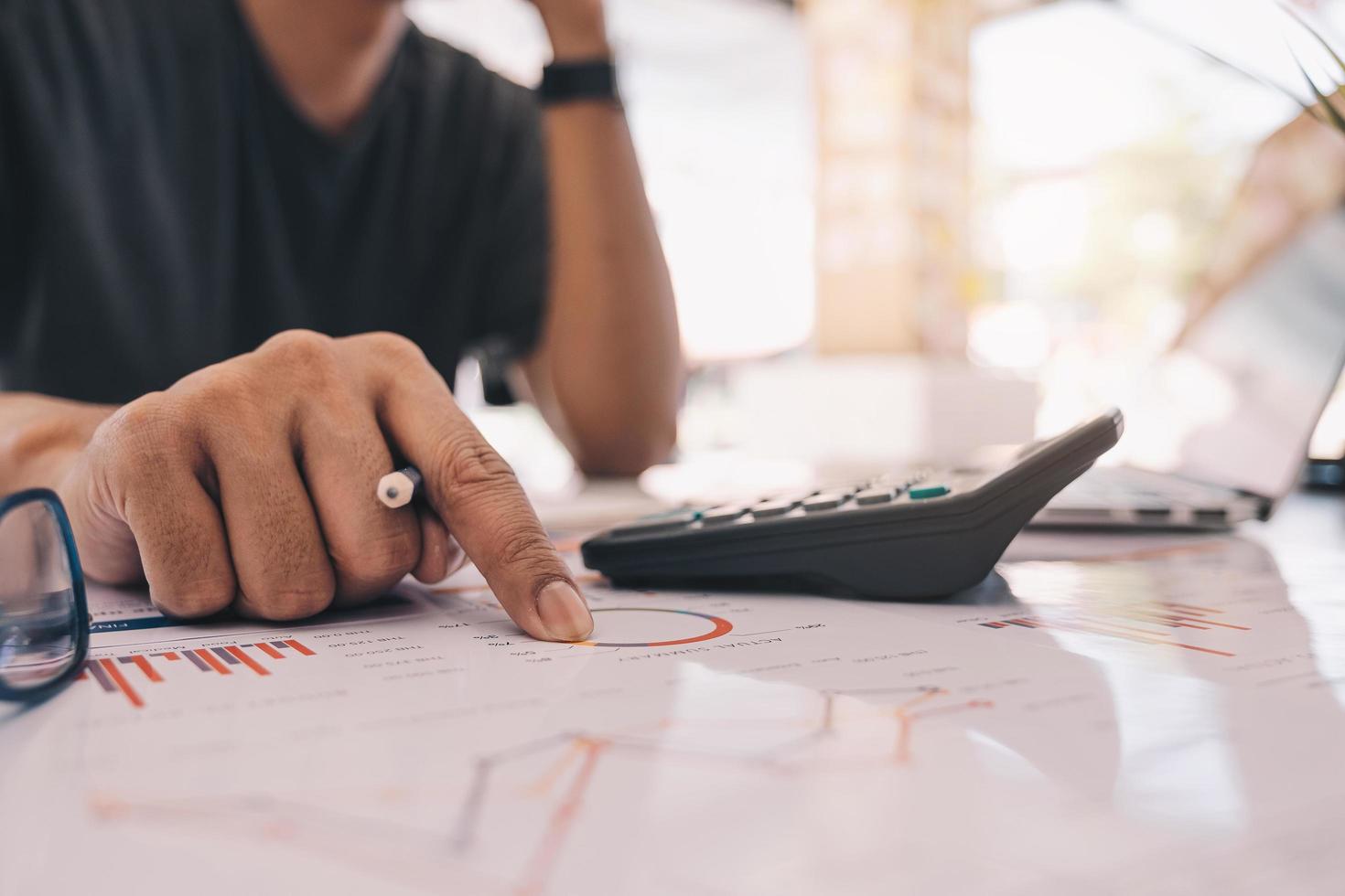 Accountant using a calculator photo