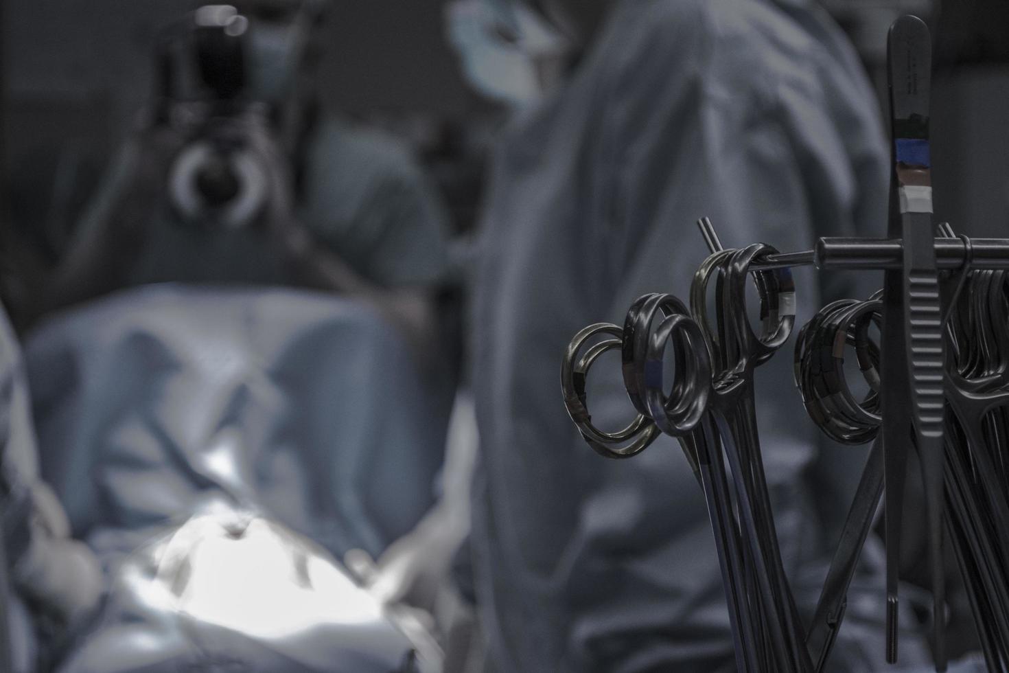 Gray surgical scissors in operating room photo