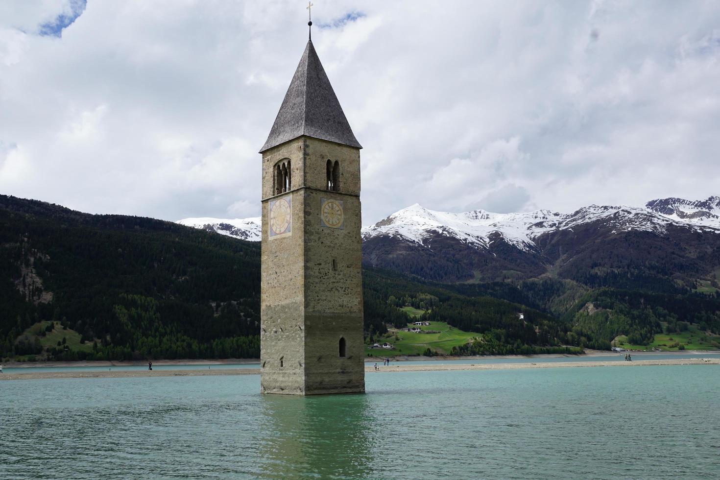 Church tower in Resia Lake photo