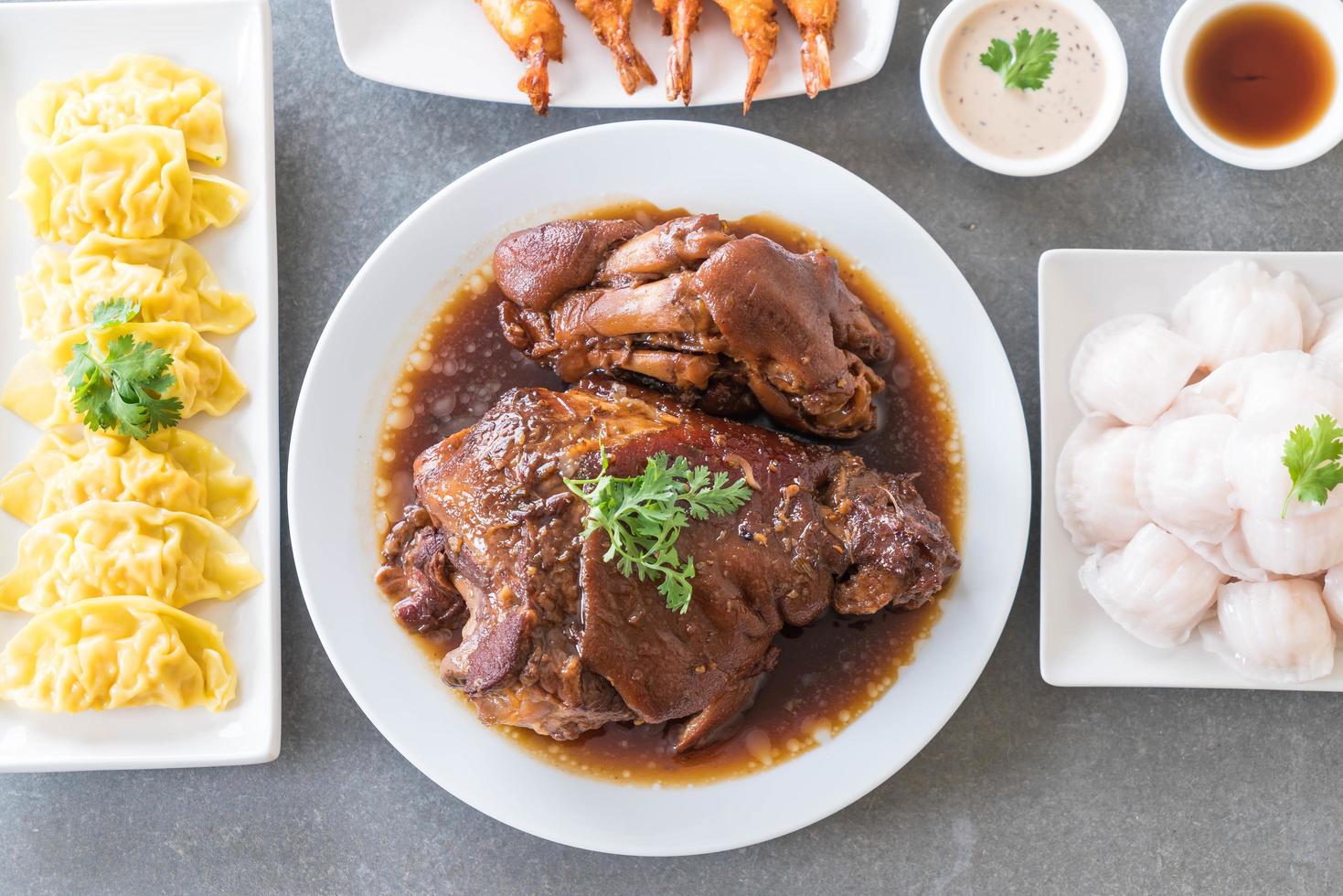 Top view of stewed pork leg in gravy sauce photo