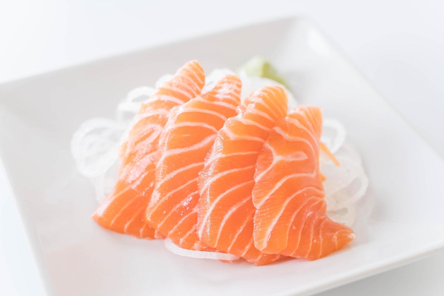 Salmon sashimi on a plate photo