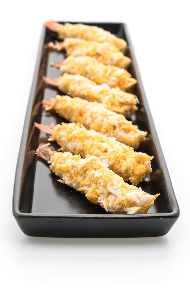 Fried prawns on a black plate photo