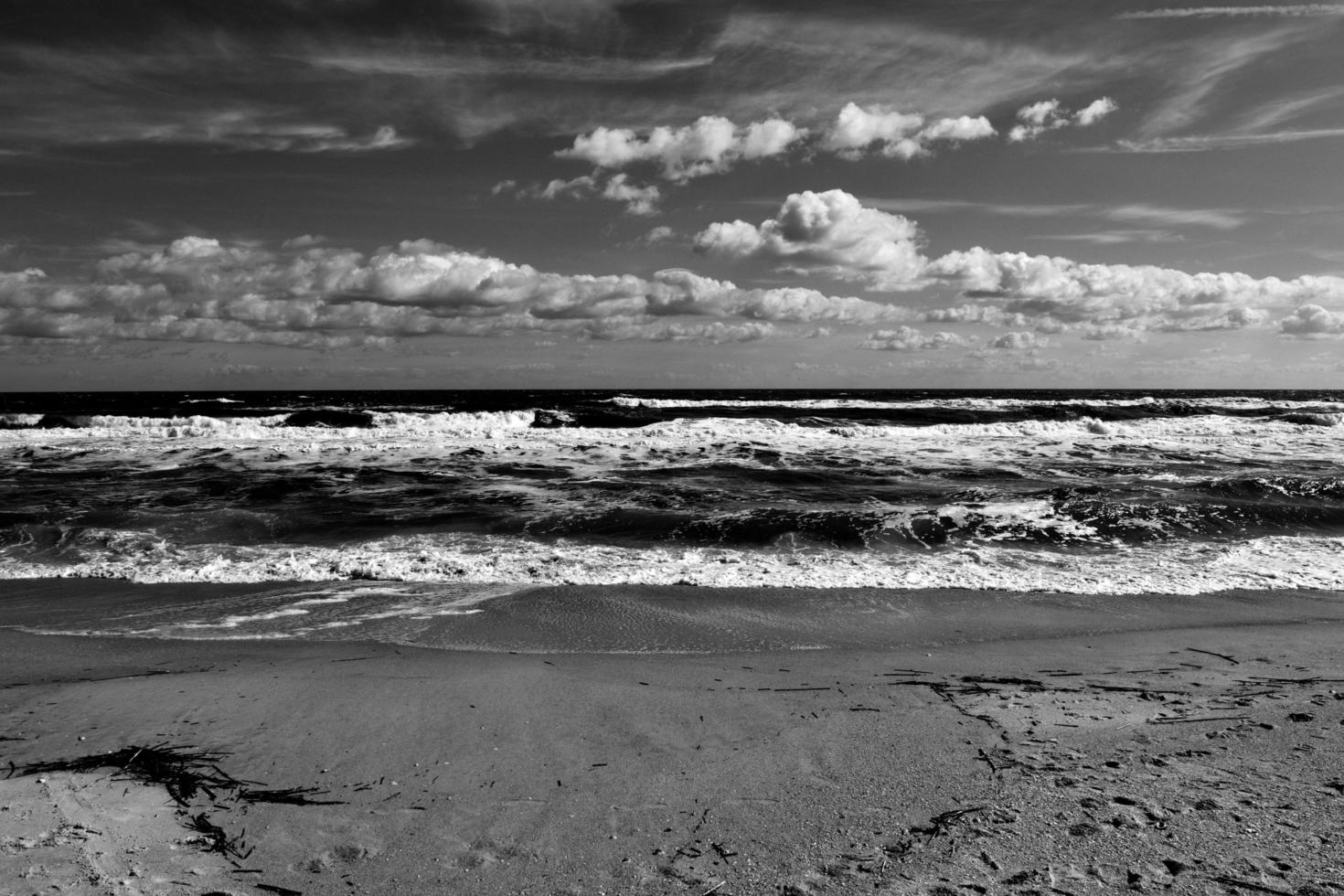 Ocean waves crashing at the beach photo