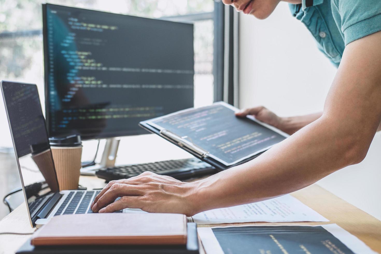 Professional programmer working at company office photo