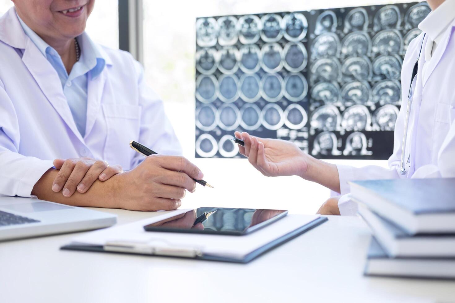 Professional doctor discussing a method with patient for treatment photo