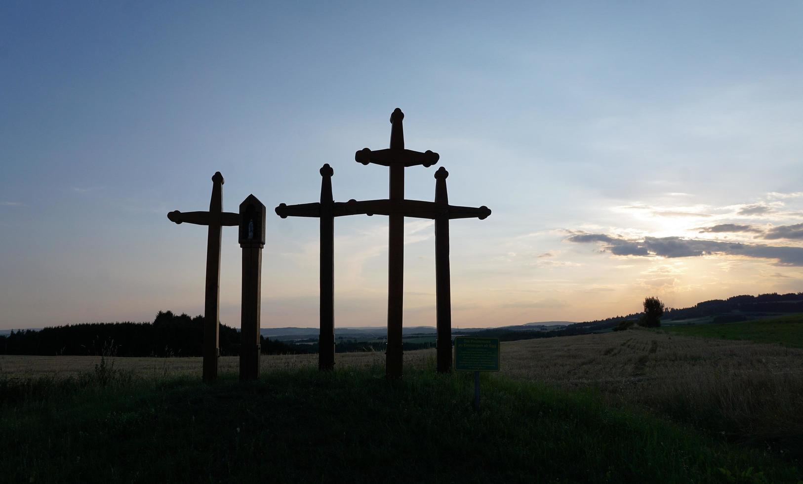 Crosses at sunset photo