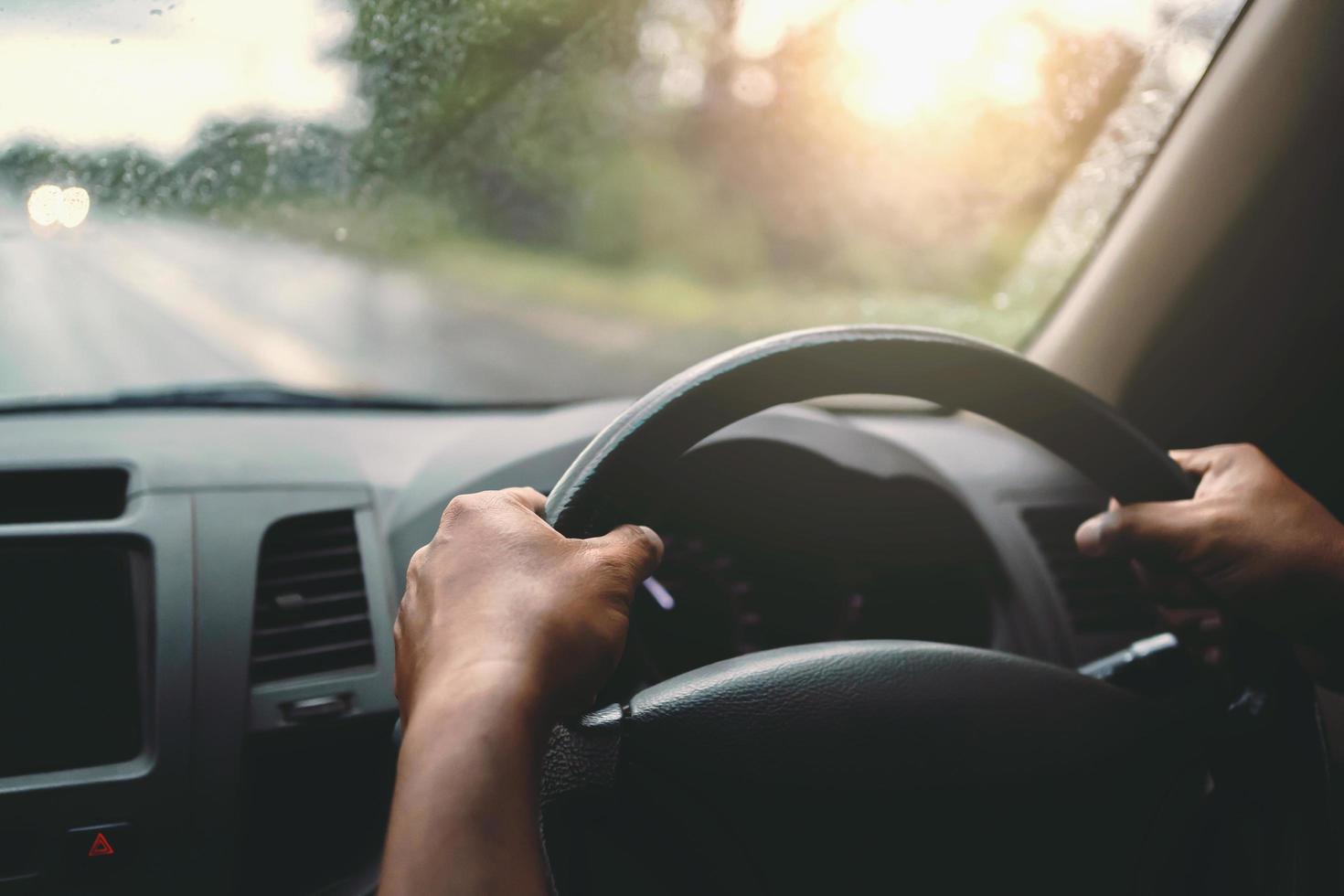 Hands on steering wheel photo