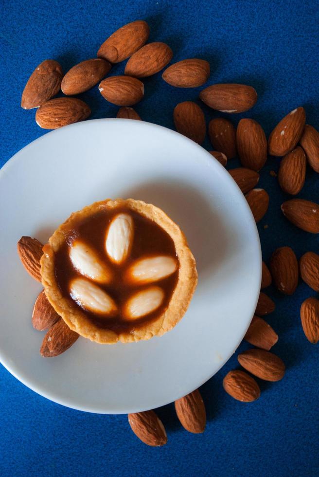 Small almond salted caramel tart photo