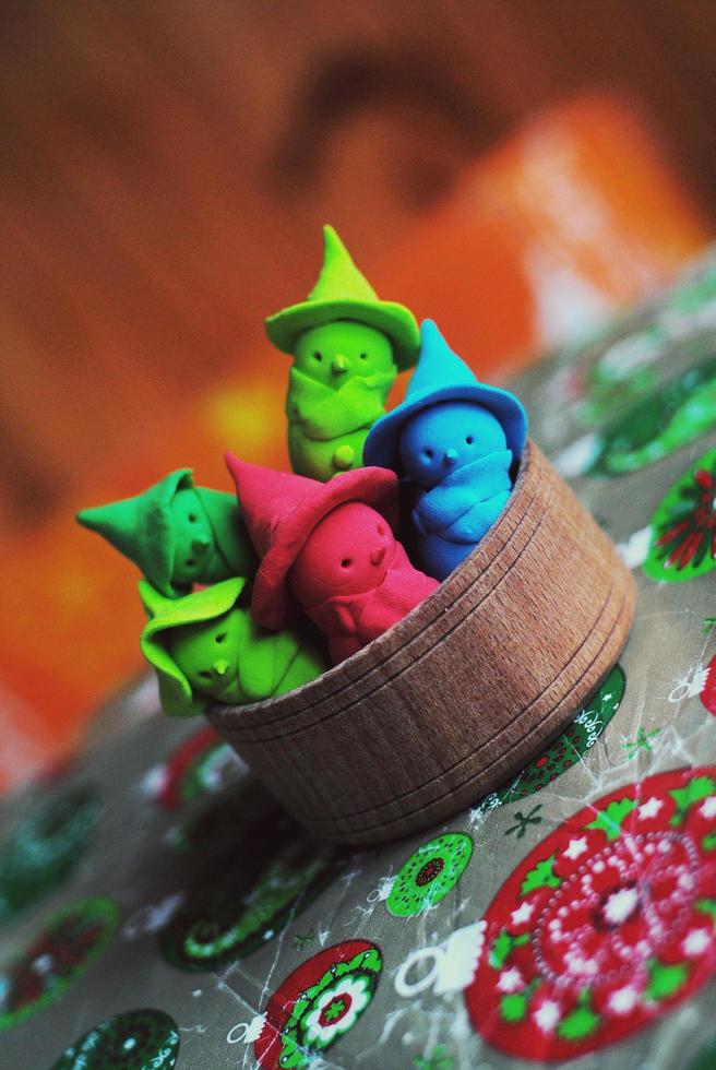 Small cute colorful snowmans from plasticine photo