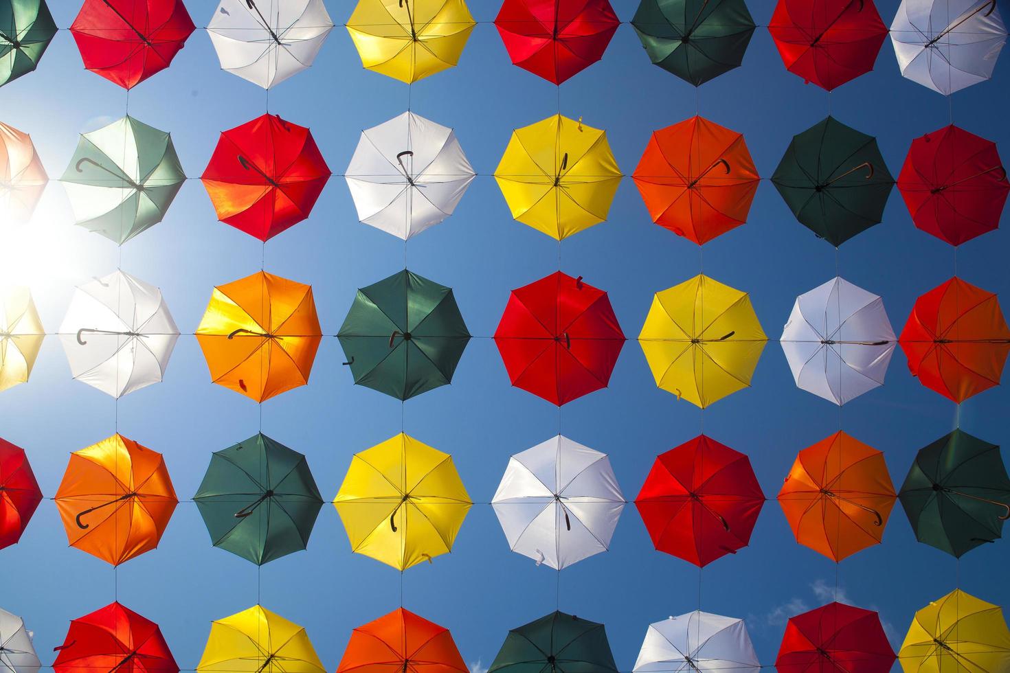 Low angle photo of umbrellas
