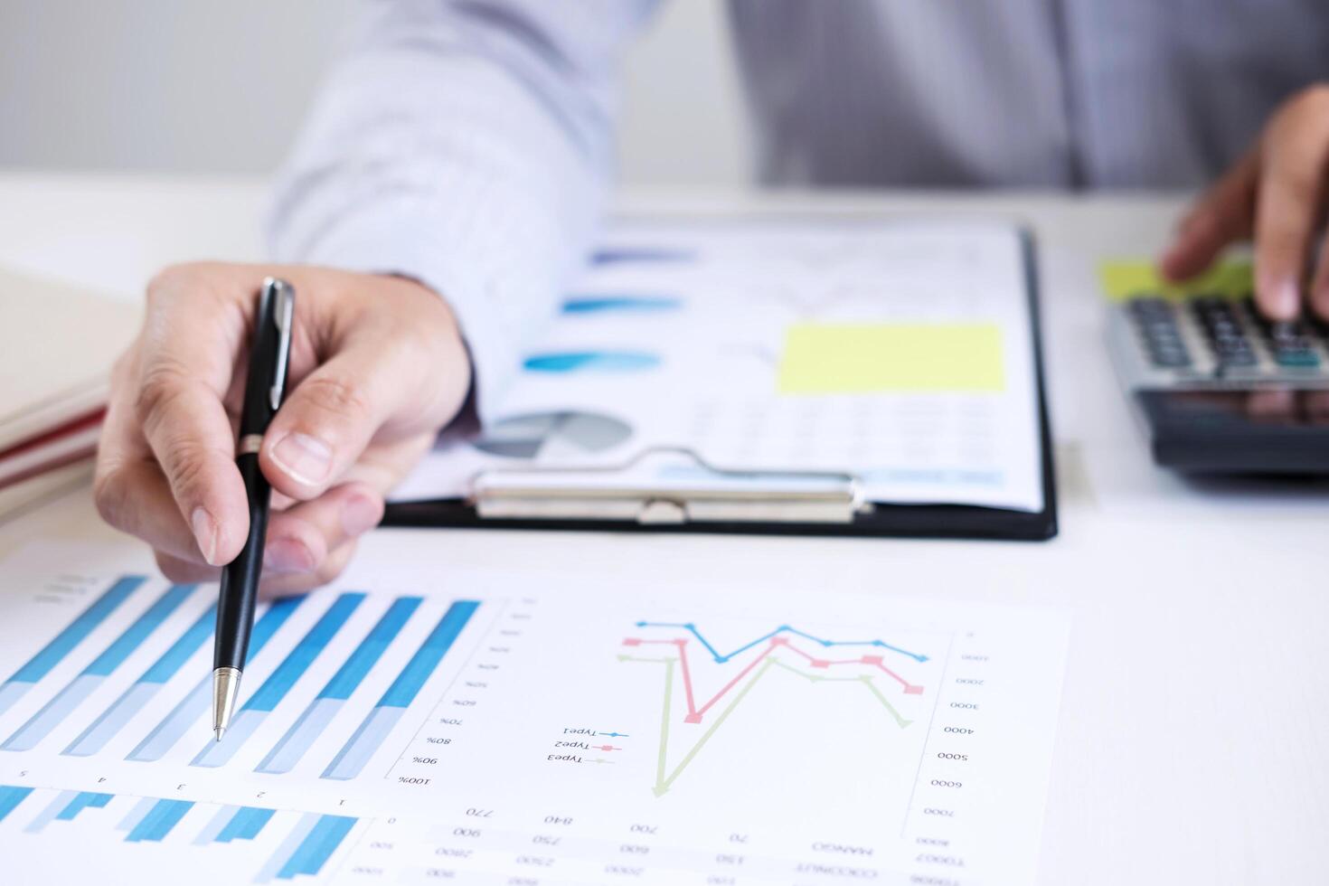 Close-up of a professional looking at a report photo