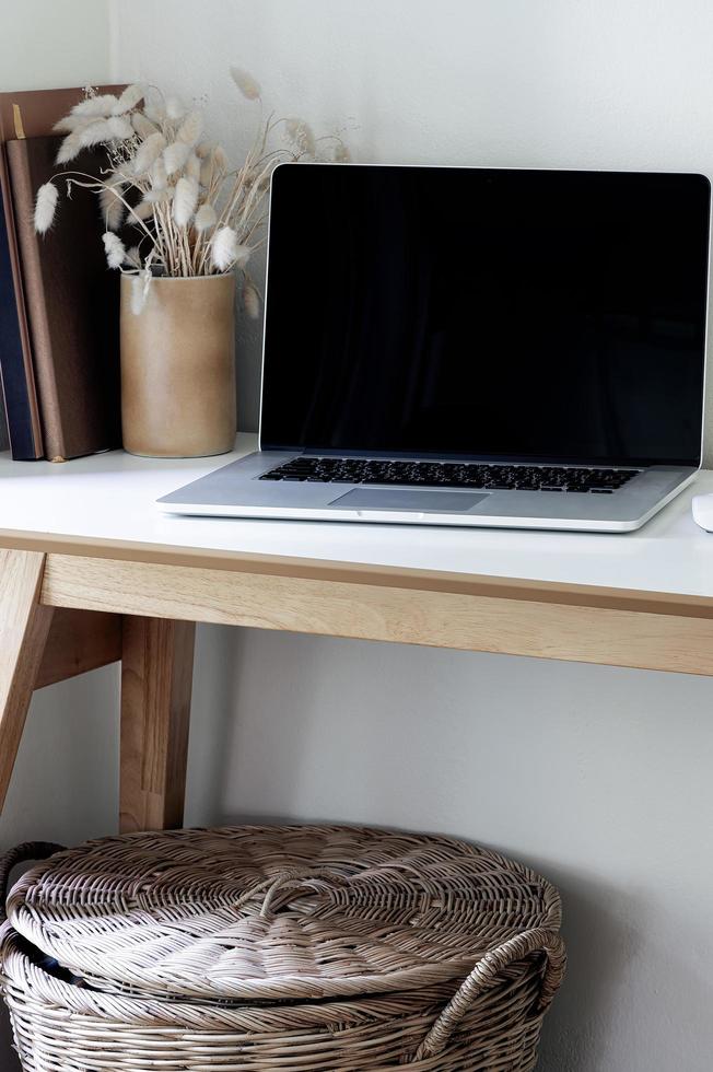 Laptop mockup in a home office photo