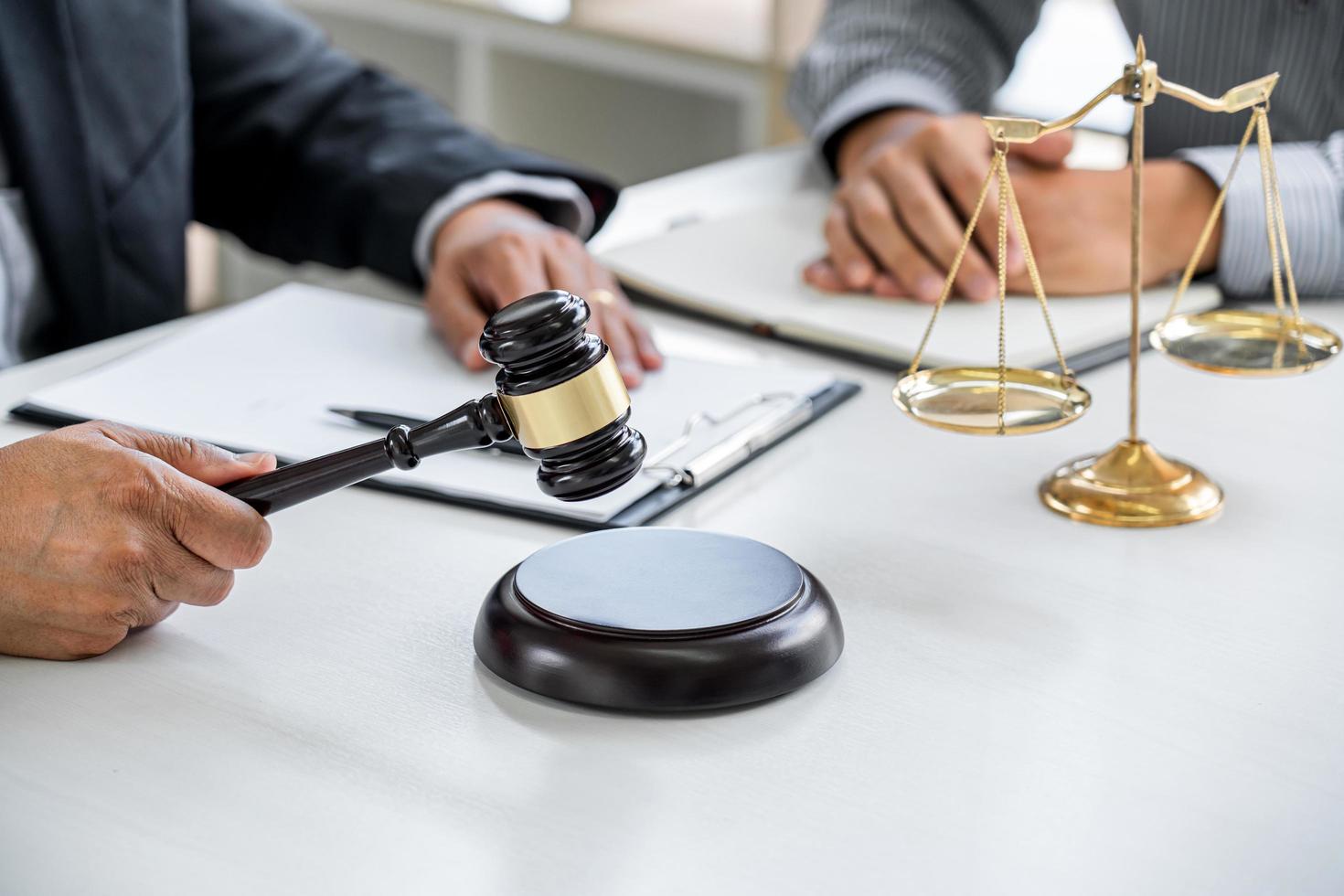 Lawyer and client discussing case photo