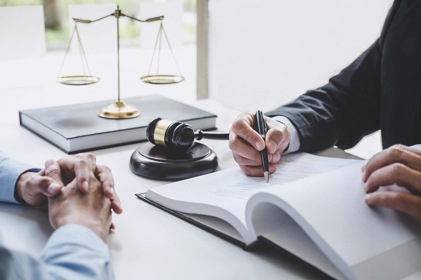 Close-up of a lawyer consulting a client photo