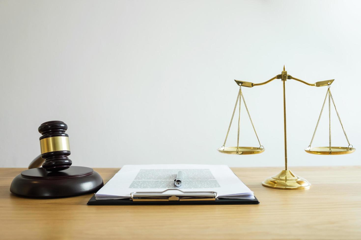 A set of law objects on a table photo