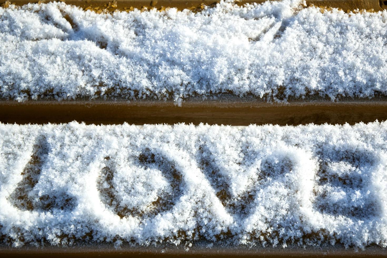 Love written in snow photo