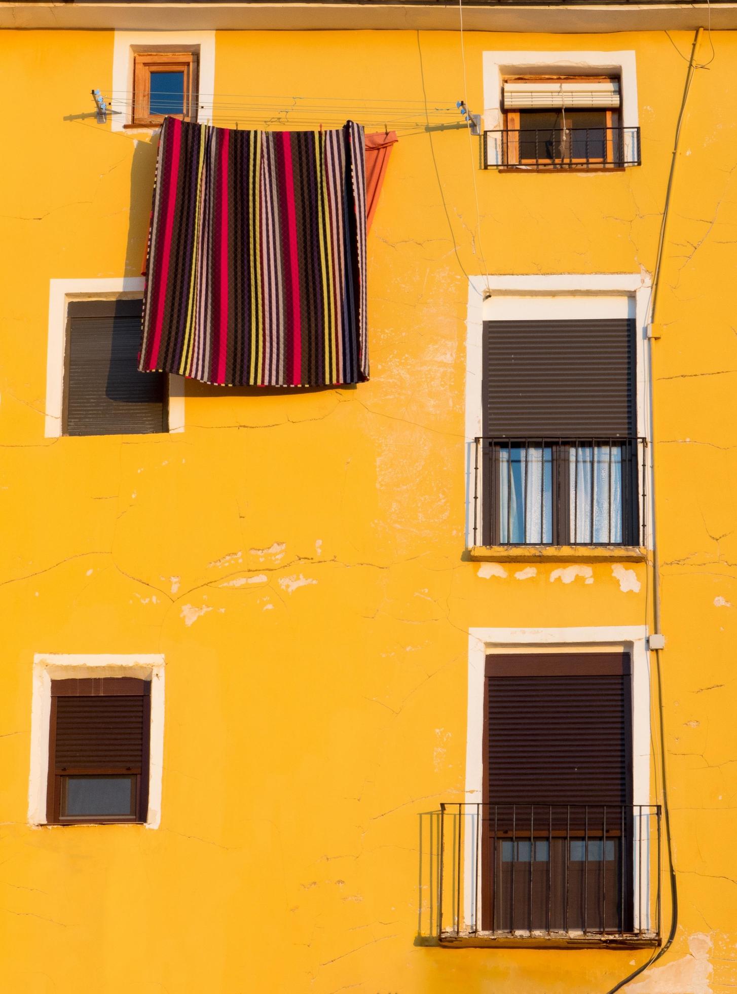 Yellow Spanish siding 1311915 Stock Photo at Vecteezy